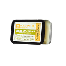 Load image into Gallery viewer, Duke Cannon Supply Co. Solid Cologne for Men Bay Rum (Citrus Musk, Cedarwood, Island Spice) - Concentrated Balm, Travel-Friendly Convenient Tin, Made with Natural & Organic Ingredients 1.5 oz (1 unit)