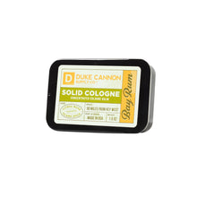 Load image into Gallery viewer, Duke Cannon Supply Co. Solid Cologne for Men Bay Rum (Citrus Musk, Cedarwood, Island Spice) - Concentrated Balm, Travel-Friendly Convenient Tin, Made with Natural & Organic Ingredients 1.5 oz (1 unit)
