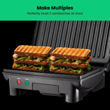 Load image into Gallery viewer, Chefman Electric Panini Press Grill, Compact 2-Slice Sandwich Maker, Non-Stick Coated Plates, Opens 180 Degrees, Dishwasher Safe, Removable Drip Tray, Stainless Steel/Black