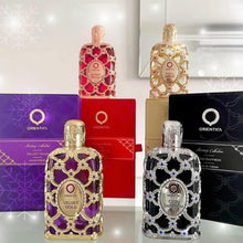 Load image into Gallery viewer, Orientica Luxury Collection Amber Rouge 4-Pc Gift Set Eau De Parfum - Woody, Amber, Saffron, Praline, Jasmine, Orange, Oak Moss, Seaweed - Arabic Perfume for Women - (2.7oz, 7.5ml & 2 X 10ml spray)