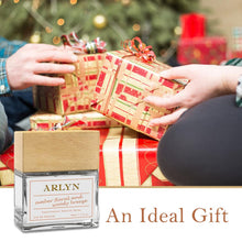 Load image into Gallery viewer, ARLYN Amber Floral and Woody Breeze Eau De Parfum, Perfume for Men & Women, Luxury Fragrance - Vegan, Cruelty-Free, and Eco-Conscious (1.7oz / 50ml)