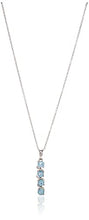 Load image into Gallery viewer, Sterling Silver Genuine Swiss Blue Topaz Four Stone Pendant Necklace, 18"