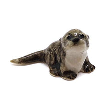 Load image into Gallery viewer, WitnyStore Sea Otter Figurines - Collectible Animal Art - Miniature Hand Made and Painted Porcelain Table Decor Perfect for Gifts and Souvenirs - 1 1/4" L x 1/2" H x 1/2" W