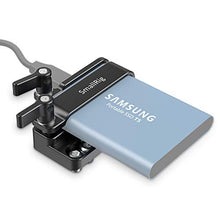 Load image into Gallery viewer, SMALLRIG Mount Bracket SSD Holder for Samsung T5 SSD with 1/4”-20 Threads, Compatible with SMALLRIG Cage for BMPCC 4K & 6K and Z CAM (New Version) – 2245B