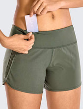Load image into Gallery viewer, CRZ YOGA Women's Quick-Dry Athletic Sports Running Workout Shorts with Zip Pocket - 4 Inches Grey Sage 4''-R403 Medium
