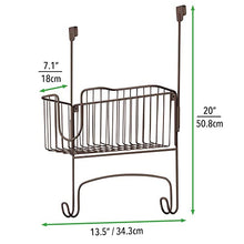 Load image into Gallery viewer, mDesign Metal Over Door Ironing Board Holder with Large Storage Basket - Holds Iron, Board, Spray Bottles, Starch, Fabric Refresher - for Laundry, Utility Room, Garage - Bronze