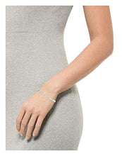 Load image into Gallery viewer, Amazon Essentials Platinum Plated Sterling Silver Round Cut Cubic Zirconia Tennis Bracelet (4mm), 7.5"
