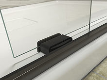 Load image into Gallery viewer, KOHLER Levity® Sliding Shower Door, 74-in H X 56-5/8 - 59-5/8-in W, with 1/4-in Thick Crystal Clear Glass with vertical blade handles, Anodized Dark Bronze
