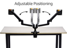 Load image into Gallery viewer, Amazon Basics Dual Monitor Stand - Lift Engine Arm Mount, Aluminum - Black