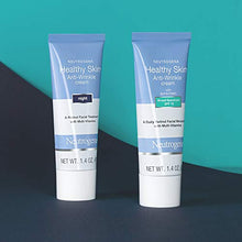 Load image into Gallery viewer, Neutrogena Healthy Skin Anti-Wrinkle Retinol & Vitamin E Daily Moisturizer with SPF 15 Sunscreen, Oil-Free Face & Neck Cream with Retinol, Vitamin E, Vitamin A & Vitamin B5, 1.4 oz
