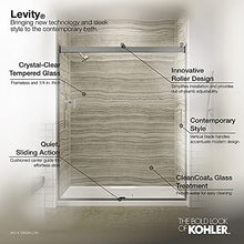 Load image into Gallery viewer, KOHLER Levity® Sliding Shower Door, 74-in H X 56-5/8 - 59-5/8-in W, with 1/4-in Thick Crystal Clear Glass with vertical blade handles, Anodized Dark Bronze