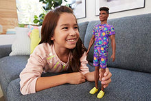 Load image into Gallery viewer, Barbie Ken Fashionistas Doll #162 with Rooted Brunette Hair Wearing Graphic Purple Top, Shorts & Yellow Shoes, Toy for Kids 3 to 8 Years Old
