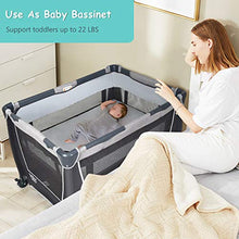 Load image into Gallery viewer, BABY JOY 4 in 1 Portable Baby Playard with Bassinet, Changing Table, Foldable Bassinet Bed & Activity Center, Newborn Napper with Toys & Music, Large Capacity Storage Shelf, Oxford Carry Bag (Grey)