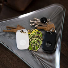 Load image into Gallery viewer, Tile Pro (2022) 2-Pack (1 Black/ 1 White). Powerful Bluetooth Tracker, Keys Finder & Item Locator for Keys, Bags & More; Up to 400 ft Range. Water-Resistant. Phone Finder. iOS and Android Compatible.