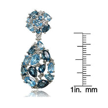 Load image into Gallery viewer, Sterling Silver London Blue, Swiss Blue and White Topaz Cluster Tonal Teardrop Dangle Earrings