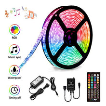 Load image into Gallery viewer, LED Strip Lights Sync to Music, Kousee 16.4ft Flexible 5m Self-Adhesive RGB Light Strips Remote Color Change 150LEDs 5050 Tape Lights Neon Ribbon Room Mood Lighting 12V for Bedroom