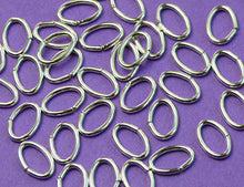 Load image into Gallery viewer, New 6.5mm x 4mm 21ga 925 Sterling Silver Oval closed Jump Rings Bails 12pc