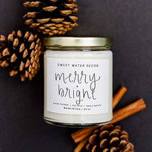 Load image into Gallery viewer, Sweet Water Decor Merry and Bright Candle | Fir, Nutmeg, and Clove, Winter Holiday Scented Soy Wax Candle for Home | 9oz Clear Glass Jar, 40 Hour Burn Time, Made in the USA
