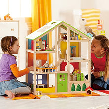 Load image into Gallery viewer, All Seasons Kids Wooden Dollhouse by Hape | Award Winning 3 Story Dolls House Toy with Furniture, Accessories, Movable Stairs and Reversible Season Theme L: 23.6, W: 11.8, H: 28.9 inch