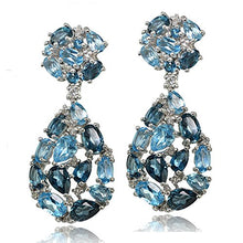 Load image into Gallery viewer, Sterling Silver London Blue, Swiss Blue and White Topaz Cluster Tonal Teardrop Dangle Earrings