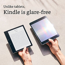 Load image into Gallery viewer, Kindle Oasis E-reader (Previous Generation - 9th) – Graphite, 7" High-Resolution Display (300 ppi), Waterproof, Built-In Audible, 32 GB, Wi-Fi - with Special Offers (Closeout)