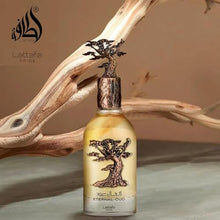 Load image into Gallery viewer, Lattafa Eternal Oud Edp - Eau De Parfum 100ml(3.4 Oz) | Grapefruit, Plum, Orchid, Heliotrope, Vanilla, Amber, Oud, Benzoin, Tonka Bean, Labdanum Perfumes
