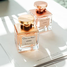 Load image into Gallery viewer, Oscar de la Renta Alibi Eau de Parfum 3 Piece Gift Set for Women - Perfume Spray 3.4 Fl. Oz, Purse Spray, Travel Spray 0.5 Fl. Oz, and Body Lotion 3.4 Fl. Oz
