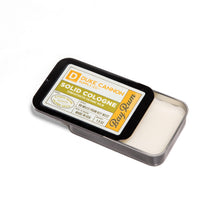 Load image into Gallery viewer, Duke Cannon Supply Co. Solid Cologne for Men Bay Rum (Citrus Musk, Cedarwood, Island Spice) - Concentrated Balm, Travel-Friendly Convenient Tin, Made with Natural &amp; Organic Ingredients 1.5 oz (1 unit)
