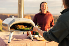 Load image into Gallery viewer, Ooni Karu 12 Multi-fuel Outdoor Portable Pizza Oven - Reaches 950°F and Cooks 12 Inch Pizzas in 60 Seconds. Versatile Wood or Propane Gas Fired Grill with Pizza Stone

