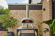 Load image into Gallery viewer, Ooni Karu 12 Multi-fuel Outdoor Portable Pizza Oven - Reaches 950°F and Cooks 12 Inch Pizzas in 60 Seconds. Versatile Wood or Propane Gas Fired Grill with Pizza Stone
