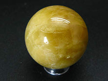Load image into Gallery viewer, Large Agni Golden Yellow Cats Eye Danburite Sphere Ball from Tanzania - 1.4" - 63.5 Grams
