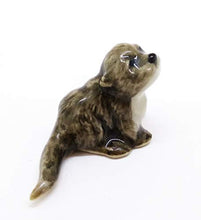 Load image into Gallery viewer, WitnyStore Sea Otter Figurines - Collectible Animal Art - Miniature Hand Made and Painted Porcelain Table Decor Perfect for Gifts and Souvenirs - 1 1/4" L x 1/2" H x 1/2" W
