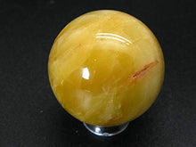 Load image into Gallery viewer, Large Agni Golden Yellow Cats Eye Danburite Sphere Ball from Tanzania - 1.4" - 63.5 Grams
