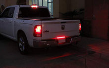 Load image into Gallery viewer, iJDMTOY Red Lens 54-SMD Full LED Tailgate ID Lightbar w/ F1 Strobe Flash Feature Compatible With 2006-up Dodge RAM 1500 2500 3500 Heavy Duty
