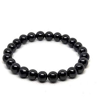 Load image into Gallery viewer, Pachamama Essentials Shungite Set, Comprehensive EMF Protection Gift Set | Shungite Stone Kit Contains Pyramid 2", 8mm Bead Bracelet and 5 Tumbled Stones
