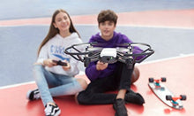 Load image into Gallery viewer, Ryze Tech Tello - Mini Drone Quadcopter UAV for Kids Beginners 5MP Camera HD720 Video 13min Flight Time Education Scratch Programming Toy Selfies, powered by DJI, White

