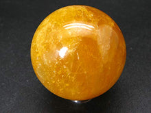 Load image into Gallery viewer, Incredible Agni Golden Yellow Danburite Cats Eye Sphere Ball from Tanzania - 1.9" - 156 Grams
