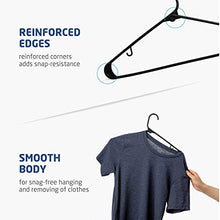 Load image into Gallery viewer, Black Standard Plastic Hangers (50 Pack) Durable Tubular Shirt Hanger Ideal for Laundry &amp; Everyday Use, Slim &amp; Space Saving, Heavy Duty Clothes Hanger for Coats, Pants, Dress, Etc. Hangs up to 5.5 lbs
