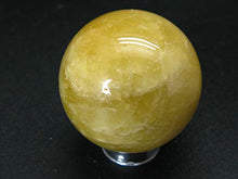 Load image into Gallery viewer, Large Agni Golden Yellow Cats Eye Danburite Sphere Ball from Tanzania - 1.4" - 63.5 Grams
