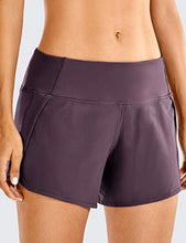 Load image into Gallery viewer, CRZ YOGA Women's Mid-Rise Quick-Dry Athletic Sports Running Workout Shorts with Zip Pocket - 4 Inches Olive Camouflage XX-Small
