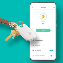 Load image into Gallery viewer, Tile Pro (2022) 2-Pack (1 Black/ 1 White). Powerful Bluetooth Tracker, Keys Finder &amp; Item Locator for Keys, Bags &amp; More; Up to 400 ft Range. Water-Resistant. Phone Finder. iOS and Android Compatible.
