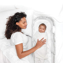Load image into Gallery viewer, Baby Delight Snuggle Nest Harmony Infant Sleeper | Silver Clouds Fabric Pattern | Portable Sleeper with Sound &amp; Light Unit | Waterproof Foam Mattress w/ Sheet
