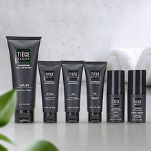 Load image into Gallery viewer, Tiege Hanley Men’s Skin Care System - Level 3 | Mens Routine Product Set: Face Wash, Anti Aging Serum, Day &amp; Night Moisturizer, Exfoliating Scrub &amp; Eye Cream | Tighten &amp; Hydrate Your Best Looking Skin
