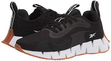Load image into Gallery viewer, Reebok Men's Zig DYNAMICA Sneaker, Black/White/Gum, 9.5
