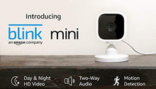 Load image into Gallery viewer, Introducing Blink Mini – Compact indoor plug-in smart security camera, 1080 HD video, motion detection, Works with Alexa – 1 camera
