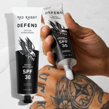 Load image into Gallery viewer, Mad Rabbit Defend Tattoo Sunscreen - SPF 30 100mL Tube - Natural Sunscreen For Tattoos - Tattoo Fade Protection Under The Sun and Moisturizer with Natural Ingredients
