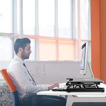 Load image into Gallery viewer, Standing Desk Converter with Height Adjustable – PUTORSEN 32 inch Stand Up Desk, Ergonomic Sit Stand Dual Monitor and Laptop Riser Tabletop Workstation Black

