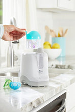 Load image into Gallery viewer, The First Years 2-in-1 Simple Serve Bottle Warmer | Quickly Warm Bottles of Breastmilk or Formula | Sanitize Pacifiers | Compact Design | Holds Wide Narrow and Angled Bottles
