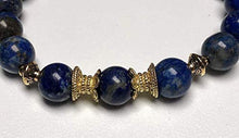 Load image into Gallery viewer, Stunning lapis lazuli bracelet Yoga Jewelry wrist mala Fifth chakra Throat Chakra Big 10 mm unisex stretch bracelet | Energized chakra bracelet | w/zinc alloy gold plated spacers (Style-1)
