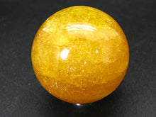 Load image into Gallery viewer, Incredible Agni Golden Yellow Danburite Cats Eye Sphere Ball from Tanzania - 1.9" - 156 Grams
